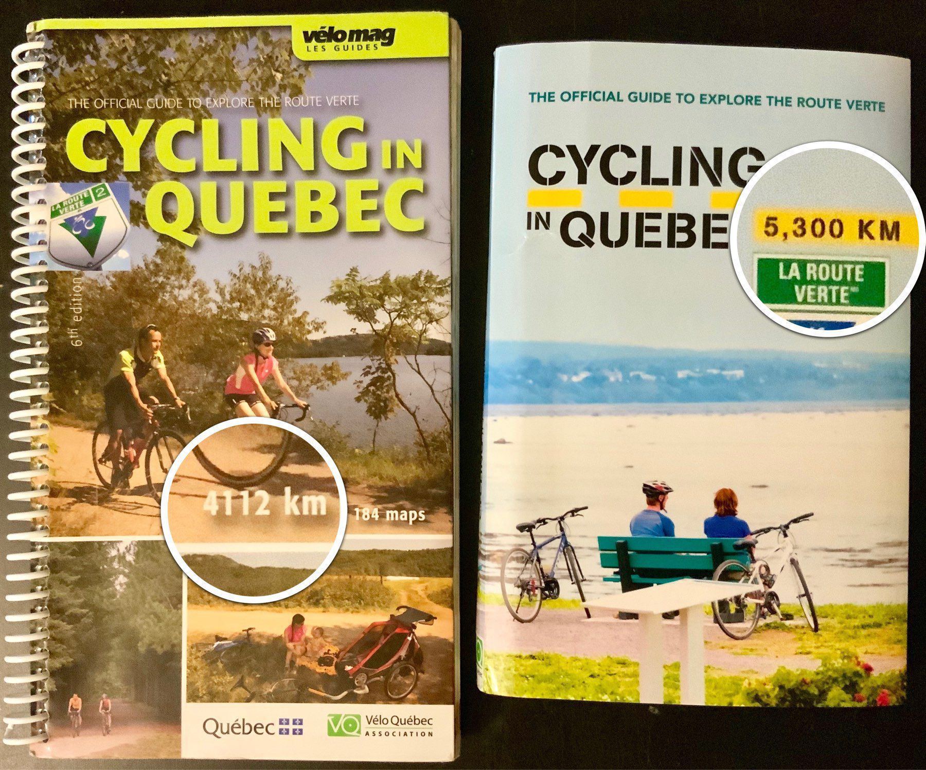Two editions of Cycling in Quebec books, the official guide to explore the Route Verte, showing how many kilometres of bikeways they cover.